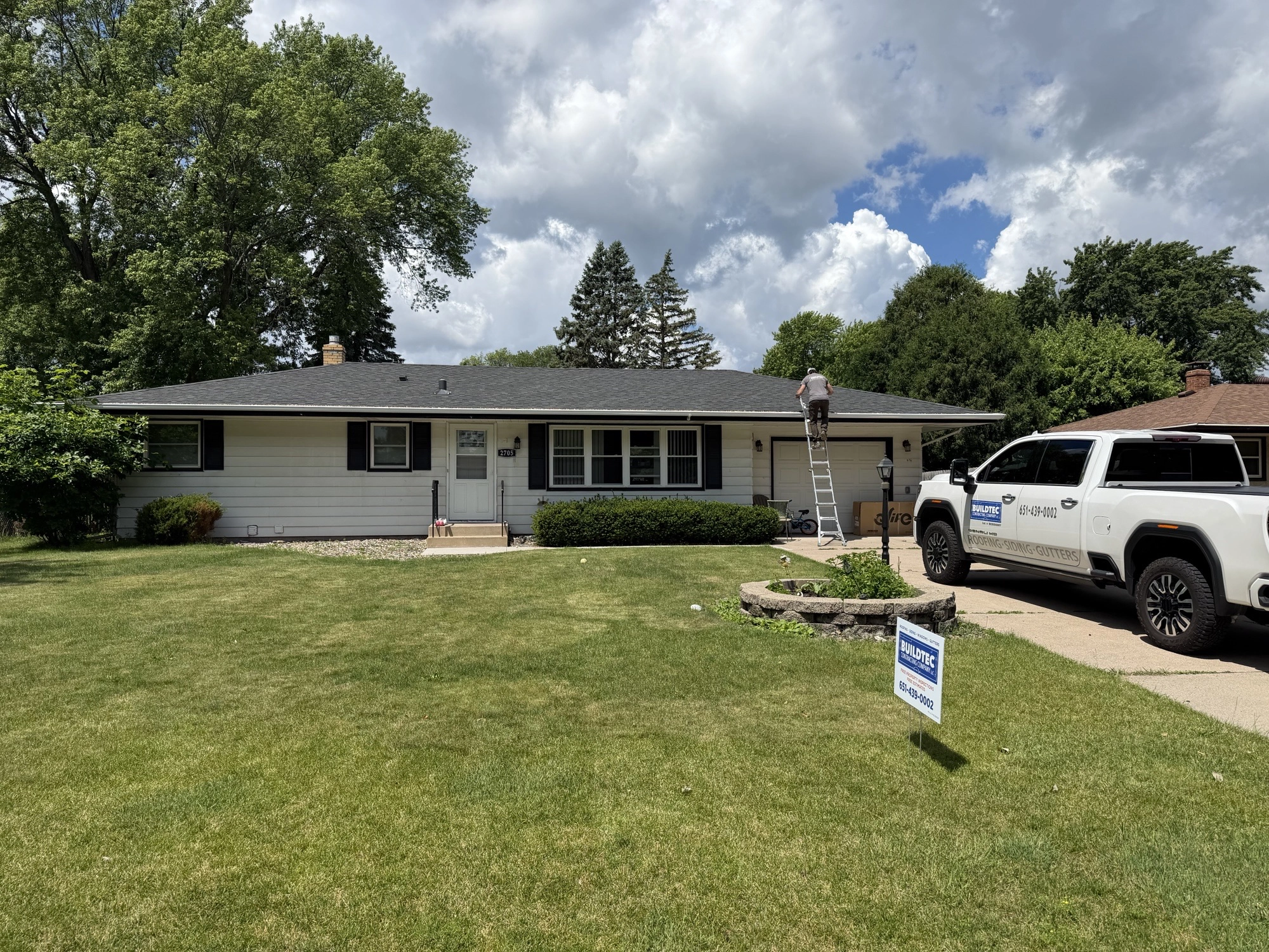 Buildtec performing a storm damage inspection in Roseville, MN.
